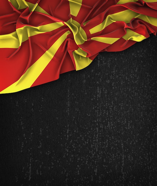 Republic of Macedonia Flag Vintage sur un tableau noir grunge avec un espace pour le texte