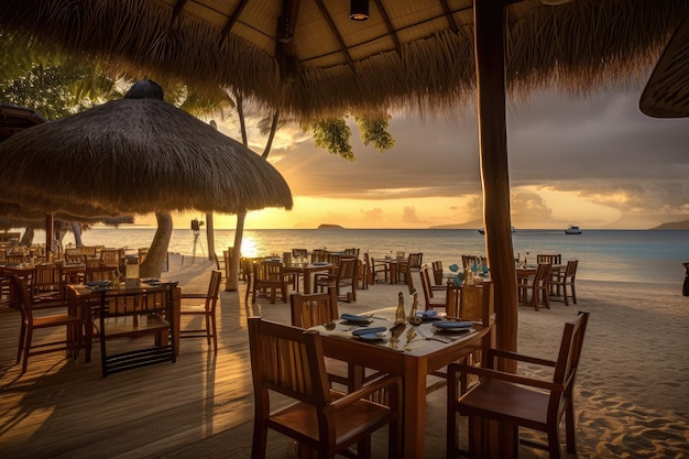 Restaurant en bord de plage avec vue sur l'océan et coucher de soleil chaleureux servant des plats de fruits de mer frais