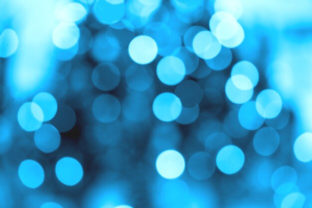 Résumé de bokeh bleu sur fond