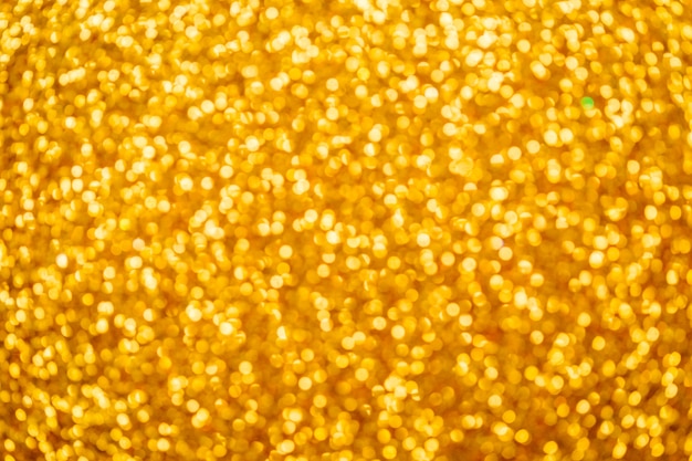 Résumé bokeh de paillettes d&#39;or pour le fond