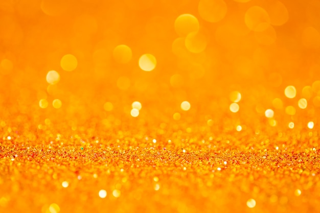 Résumé bokeh de paillettes d&#39;or pour le fond