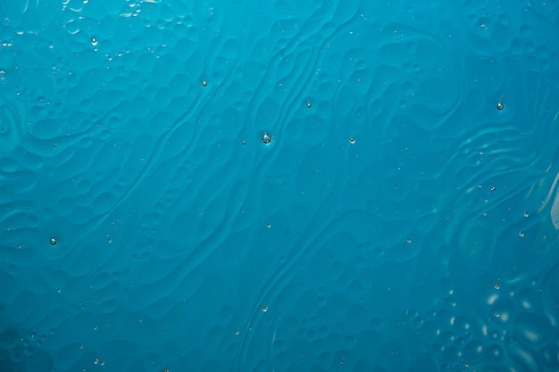 Photo résumé de macro colorfull monde de bulles en fond de surface de l'eau