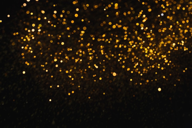 Résumé de paillettes d'or bokeh pour le fond