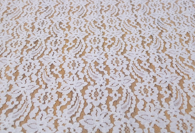 Rideau blanc de texture de tissu sur le fond en bois