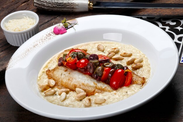 Risotto au filet de poisson et aux amandes