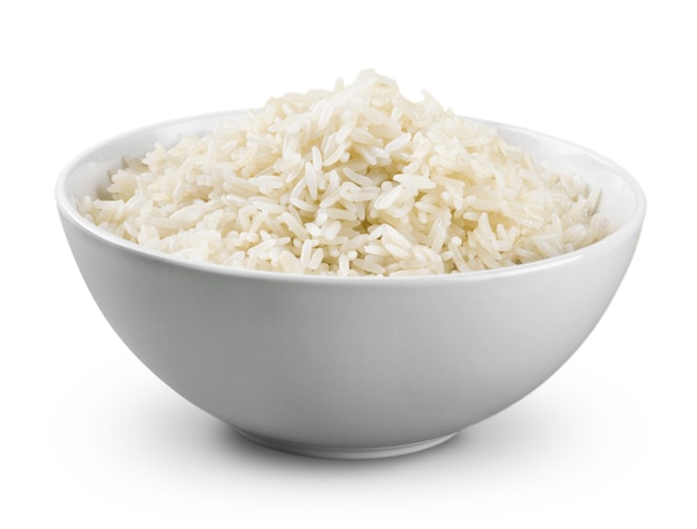 Riz dans un bol sur fond blanc