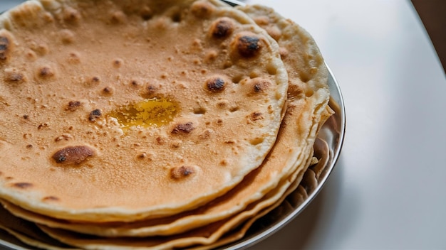 Photo le rotis indien du chapati tava