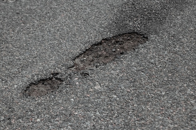 La Route En Mauvais état Avec Beaucoup De Nids De Poule