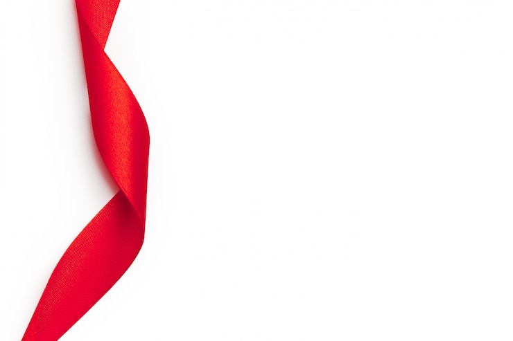 Photo un ruban rouge sur fond blanc