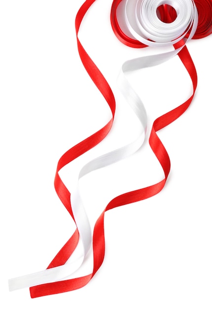 Photo rubans rouges et blancs colorés isolés sur blanc