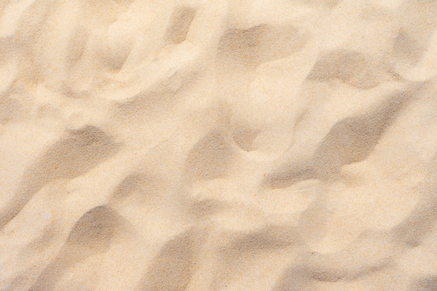 Sable fin de plage au soleil d&#39;été