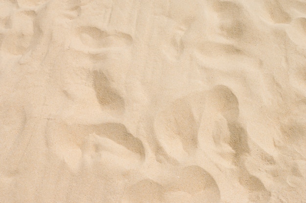 Sable fin de plage au soleil d&#39;été