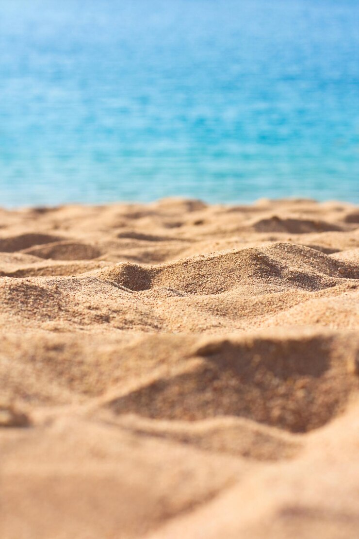 Sable de plage en été voyage vacances paysage marin et concept de vacances d'été