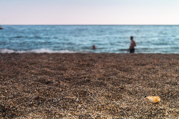 Photo sable de plage de galets fins sur fond de mer