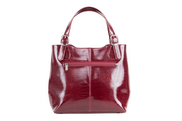 Sac en cuir de dames élégant rouge sur fond blanc, vue arrière