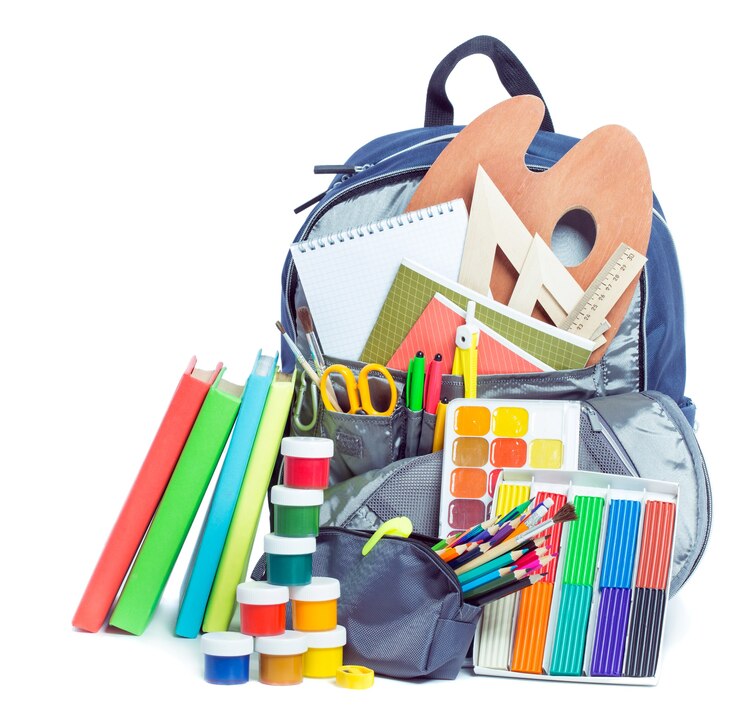 Photo sac d'école avec des choses pour l'école