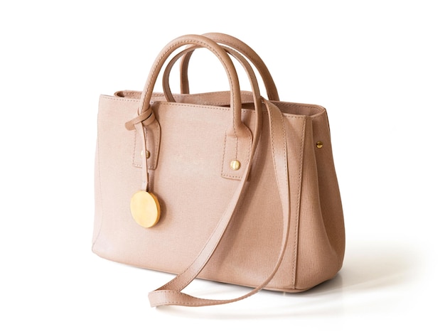 Sac à main femme en cuir beige isolé sur fond blanc