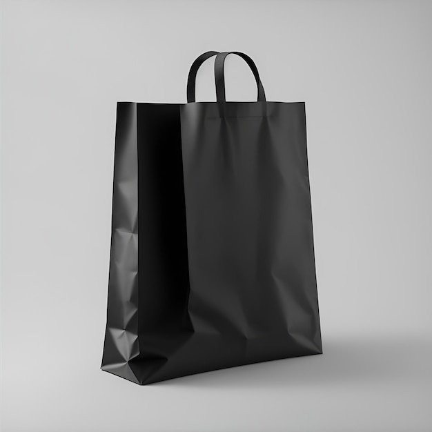 Un sac noir avec une maquette de sac en papier à poignée