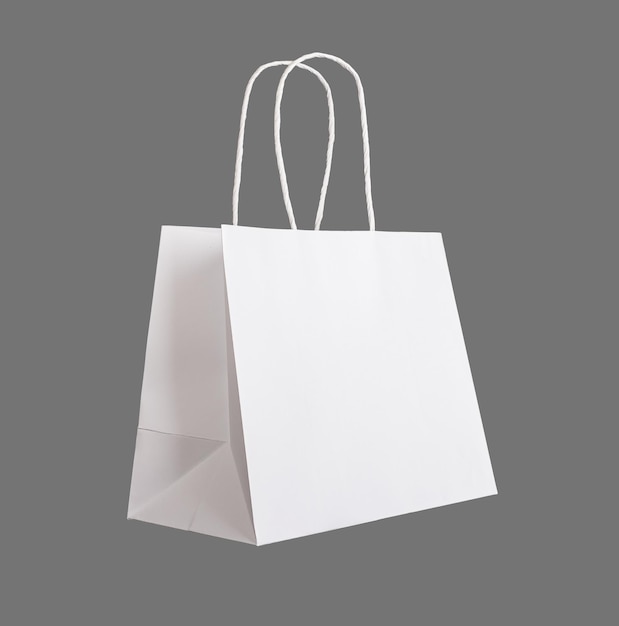 Sac en papier blanc pour colis d'achat avec poignées isolées