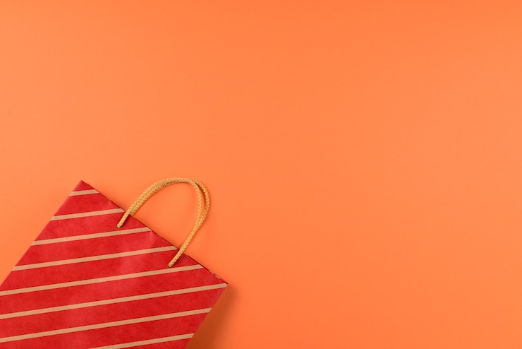 Photo sac en papier rouge à rayures