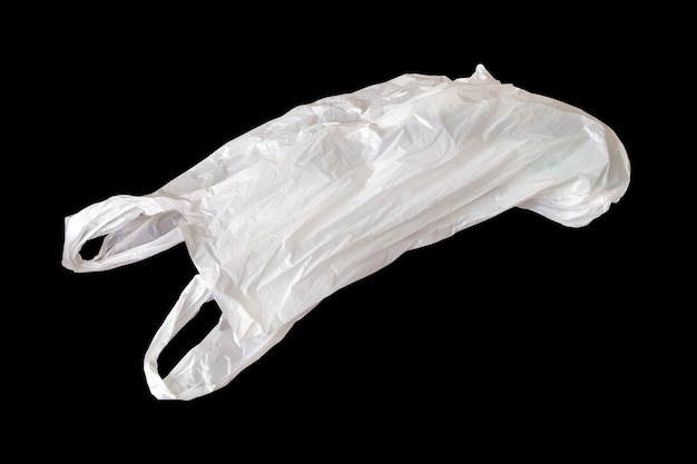 Sac en plastique blanc isolé sur fond noir