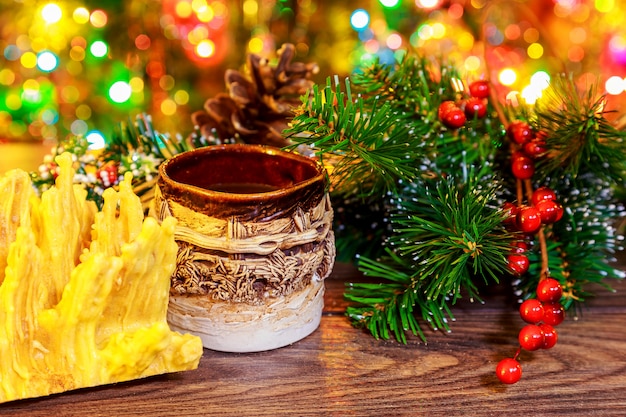 Sakotis nouvel an des arbres et joyeux noël bougie