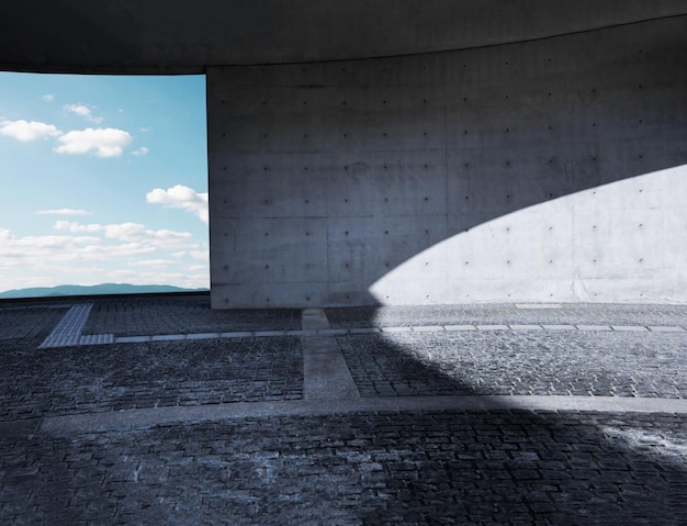 Salle vide avec un mur en béton et un sol blanc