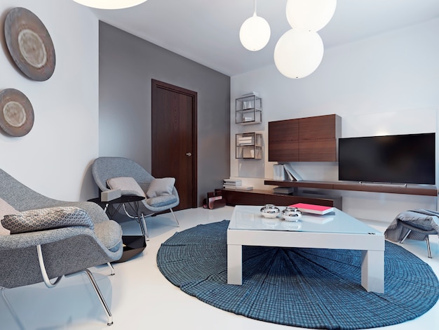 Salon blanc avec meuble TV et étagères de salon lumineux avec des murs blancs et gris avec table basse blanche sur tapis bleu au centre.