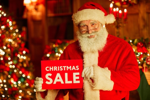 Santa Holding Sale Sign