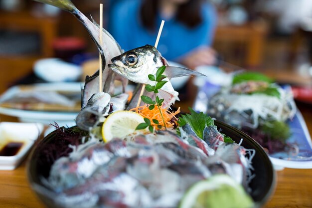 Sashimi de poisson plat