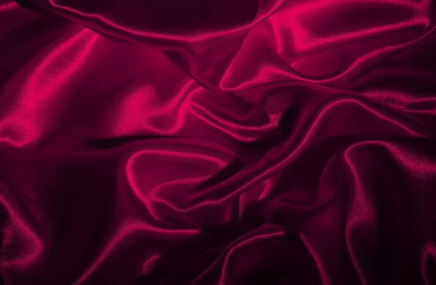 satin de soie pourpre beaux plis doux tissu brillant fond de luxe lumineux espace pour le design