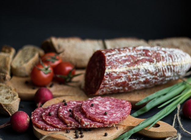 Saucisse au pain au poivre et pommes de terre