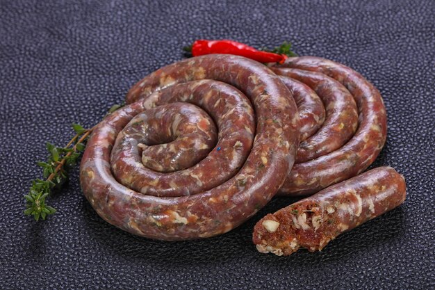 Saucisses d'agneau crues