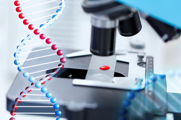 science, chimie, biologie, médecine et concept de recherche - gros plan d'un microscope avec échantillon de test sanguin en laboratoire clinique