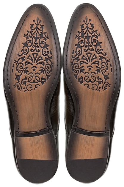 Semelle en cuir de chaussures pour hommes classiques isolées sur fond blanc
