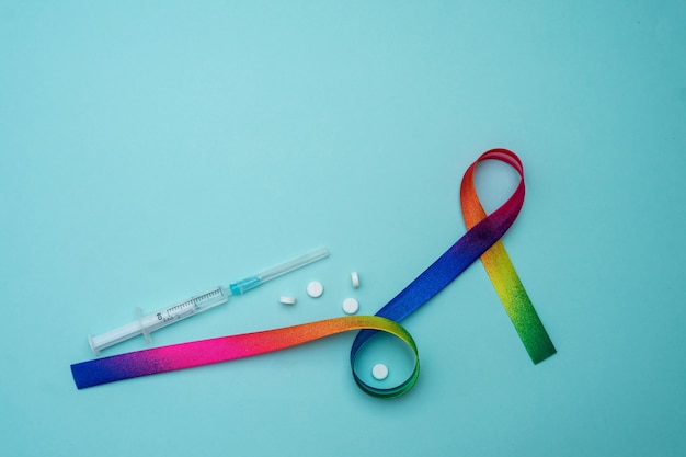 Sensibilisation au ruban arc-en-ciel. communauté LGBT. Journée mondiale du sida. Concept symbolique pour la campagne de sensibilisation sur le concept des personnes vivant avec le VIH