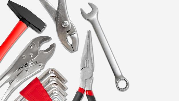 Set d'outils de construction sur un fond clair avec un espace vide