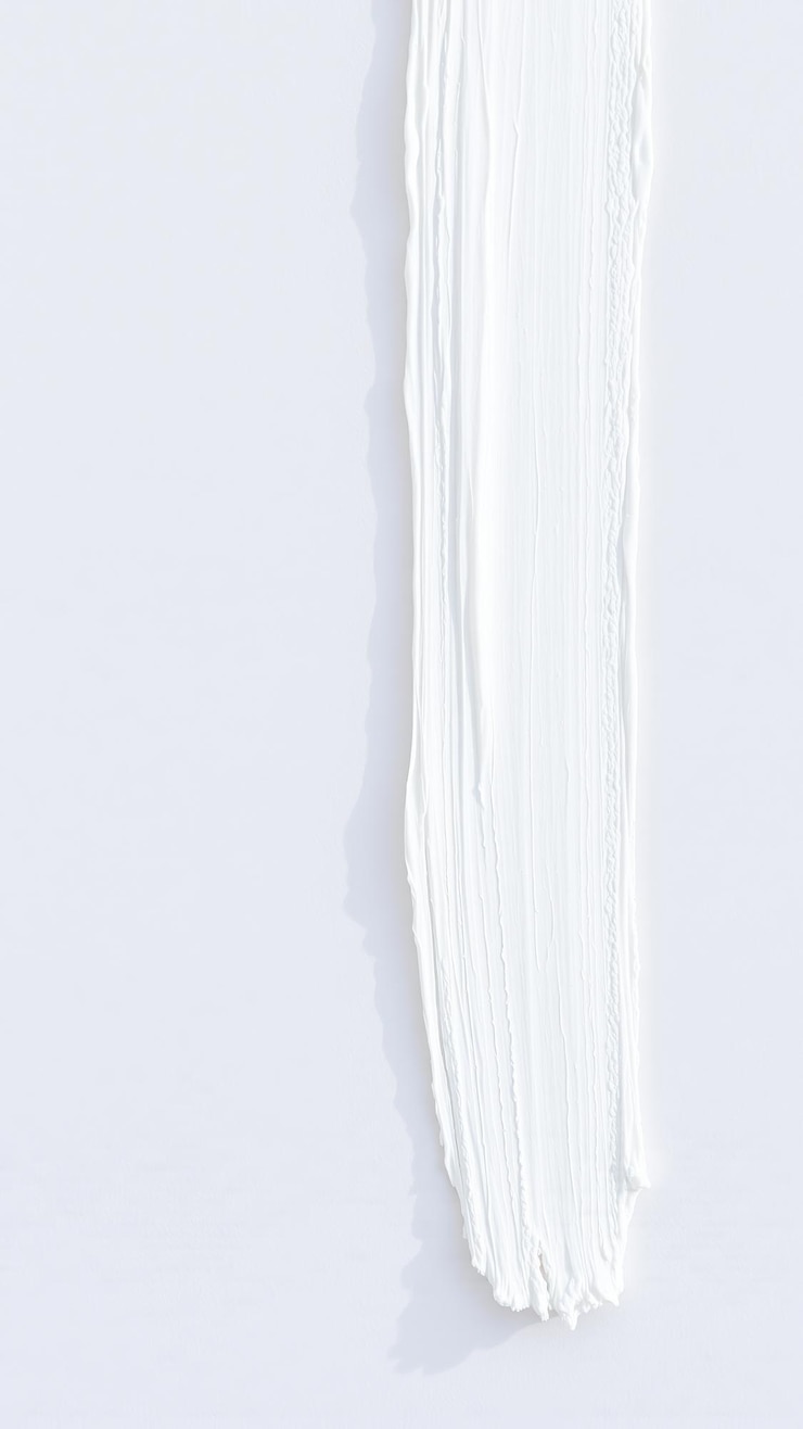 Photo une seule bande de peinture blanche sur un fond blanc