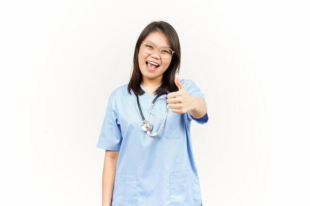 Showing Thumbs Up of Asian Young Doctor isolé sur fond blanc