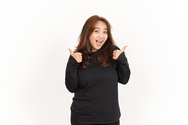 Showing Thumbs Up of Beautiful Asian Woman Wearing Black Shirt isolé sur fond blanc