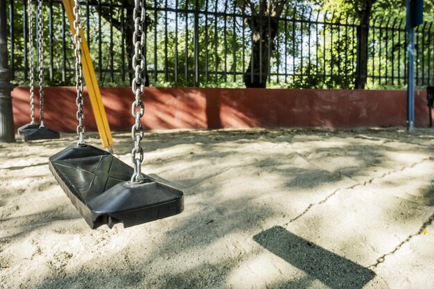 Photo siège d'une balançoire pour enfants attaché