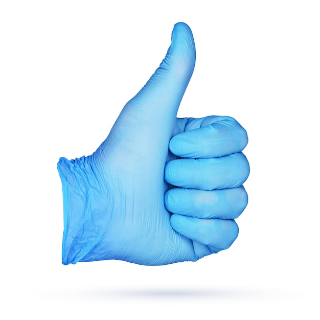 Photo signe de pouce en l'air. main dans un gant en nitrile bleu isolé sur une surface blanche.