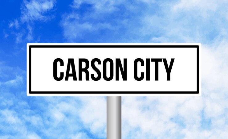 Photo signe routier de la ville de carson sur le fond du ciel