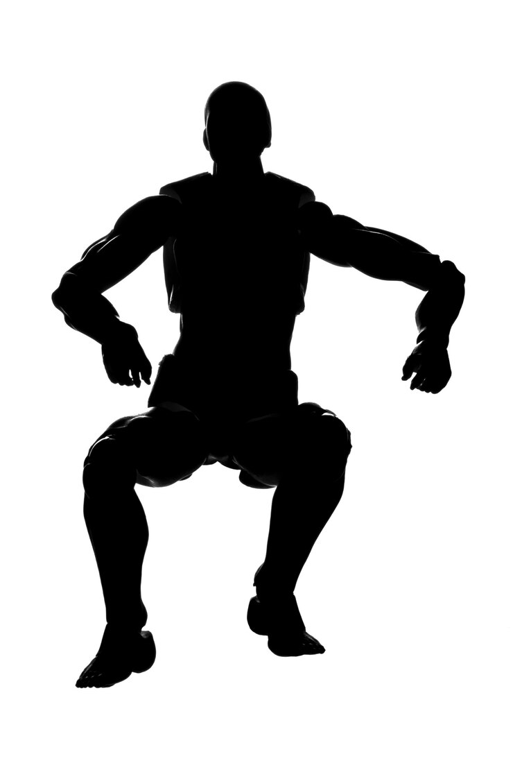 Photo silhouette d'un homme dans une pose assise sur un fond blanc