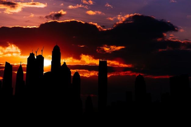 Silhouette de paysage urbain de la marina de dubaï au coucher du soleil