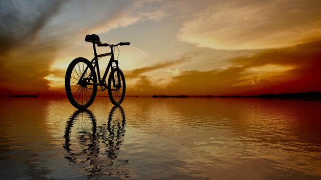 Une silhouette de vélo et son reflet d'une plage au coucher du soleil Rendu 3D