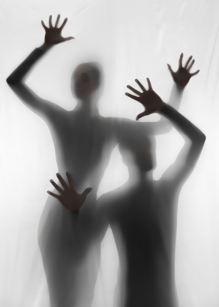 Photo silhouettes de mains terrifiantes en studio