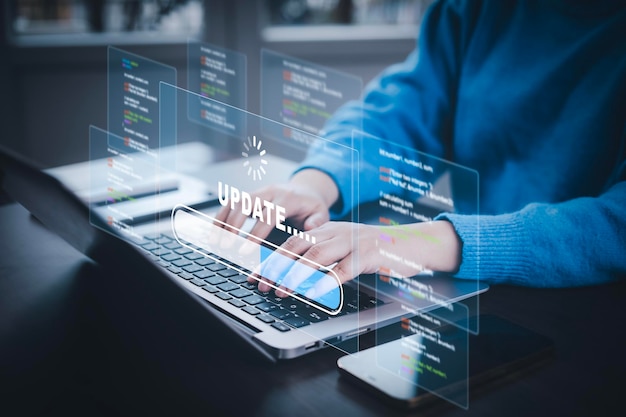 Smartphone et ordinateur portable avec mise à jour du logiciel programme informatique mise à niveau de la technologie d'affaires Internet mise à jour sur l'écran virtuel Internet et la technologie concept de chargement de la barre avec l'installation de la mise à jour