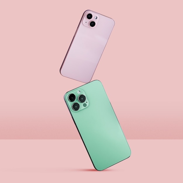 Photo smartphones en équilibre avec fond rose