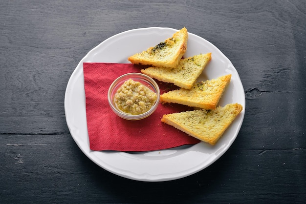 Snack pour la bière Sur un fond en bois Vue de dessus Espace libre pour votre texte